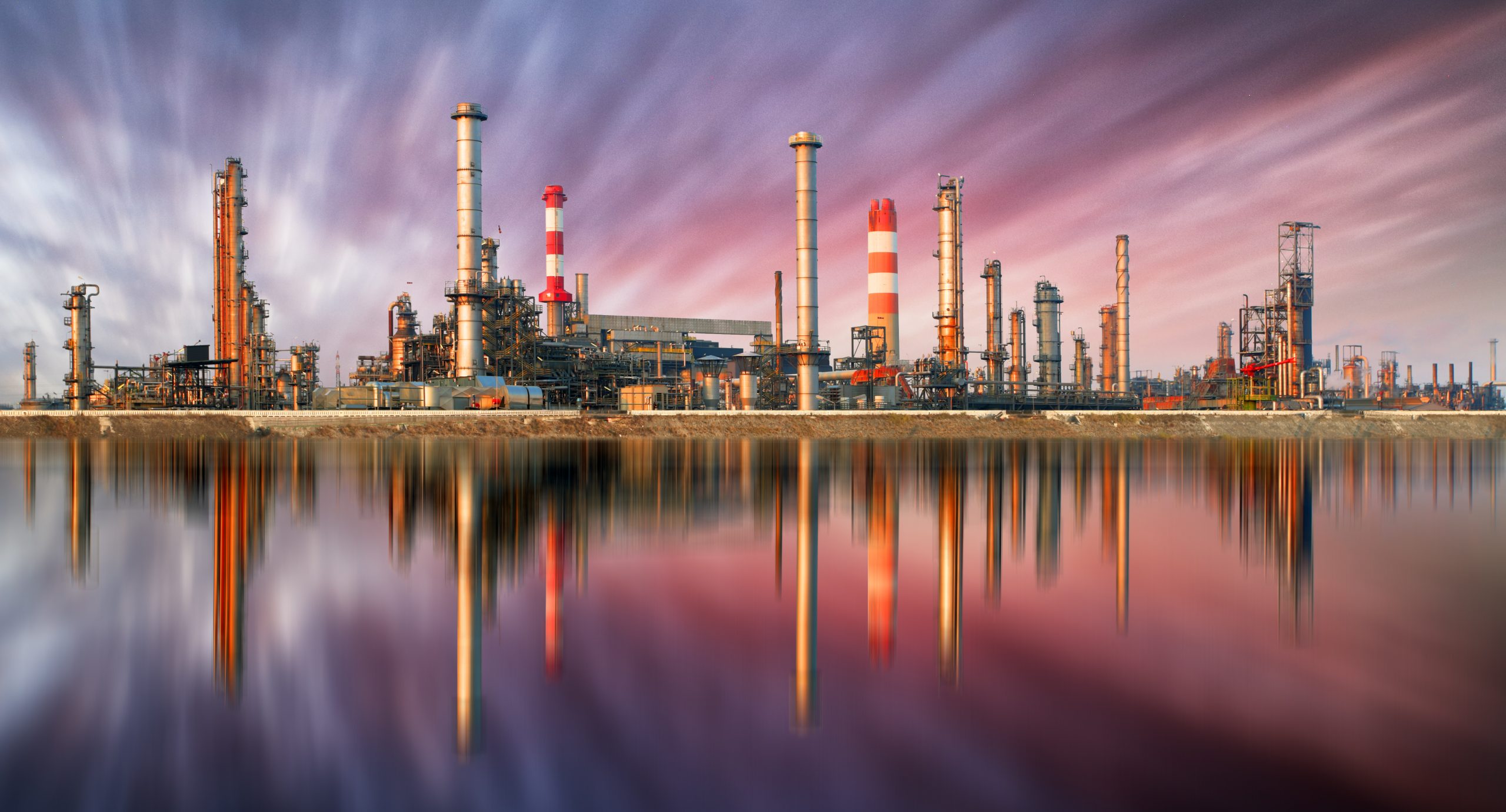 Industrial refinery at sunset